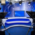 The View’ Bias EXPOSED: 102 Liberals, Zero Conservatives A television studio setup with cameras and a blue backdrop