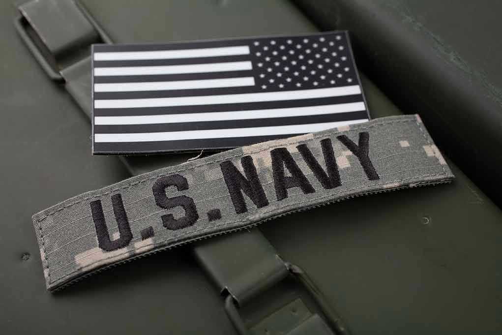 U.S. Navy patch with black-and-white American flag.