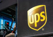 UPS Billing SKYROCKETS – Increased How Much?! UPS delivery truck driver at traffic light