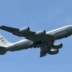 Trump Deploys Bombers —Seen in Attack Formation! Military aircraft flying in clear blue sky.