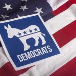 Dem Senator Praises Trump Plan—Party Stunned! Democratic Party symbol on American flag background.