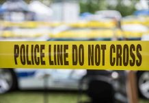 Over 20 Stab Wounds – Suicide RULED? Yellow police line tape with Do Not Cross.