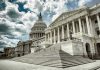 Dems REVOLT – Shutdown Deal Sparks Meltdown Capitol building with columns and cloudy sky.