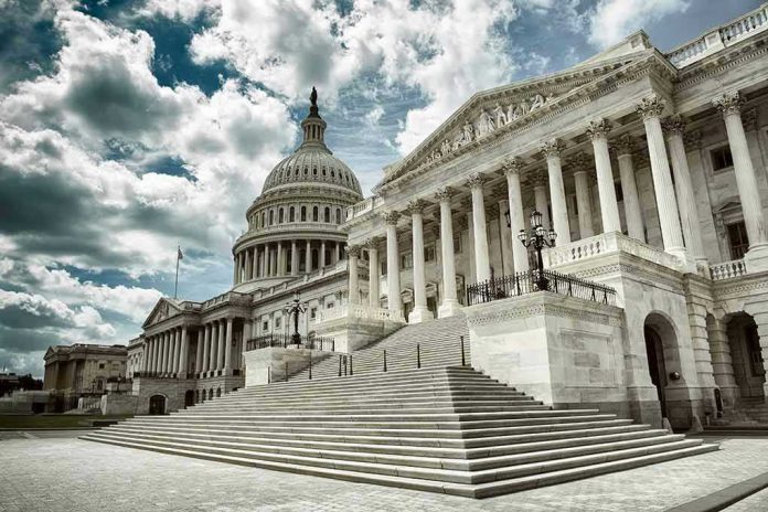 1269355039 Capitol building with columns and cloudy sky.