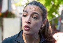 AOC Throws Curveball – Snubs New Dem Star Woman speaking with a concerned expression outdoors.