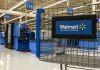 AI Shockwave Hits Walmart—1.6 Million Jobs at Risk Walmart shopping cart inside store near checkout aisle