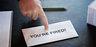 Envelope with YOURE FIRED! and pointing finger.