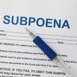 SHOCKING Subpoena Blitz: Trump’s Legal Gambit Unfolds A subpoena document with a blue pen resting on it