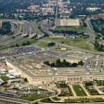 Aerial view of the Pentagon surrounded by highways and urban areas