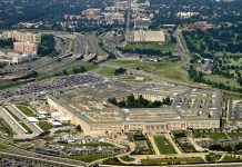 Pentagon Targets Senator: Court-Martial Threat Looms Aerial view of the Pentagon surrounded by highways and urban areas