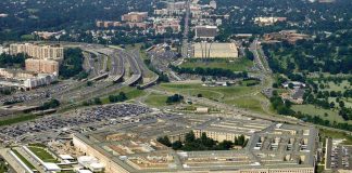 Aerial view of the Pentagon surrounded by highways and urban areas