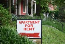 Rental Scam Surges -Tenants Being BLINDSIDED Sign indicating an apartment is available for rent
