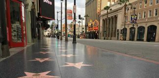 Hollywood Walk of Fame stars on sidewalk.