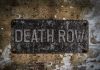 Death Row Monster’s Chilling Last Words Stuns Weathered Death Row sign on aged concrete wall