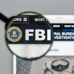 FBI Thwart New Year’s Bomb Plot – What They Found Sends Chills! FBI website shown through magnifying glass.