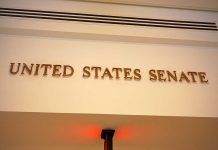 Warren Hits Trump With Bill From Hell – He Can’t Ignore This Sign displaying United States Senate in a government building