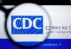 CDC SLASHES Childhood Vaccines – SHOCKING Reversal CDC logo magnified on a screen.