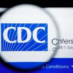 CDC SLASHES Childhood Vaccines – SHOCKING Reversal CDC logo magnified on a screen.