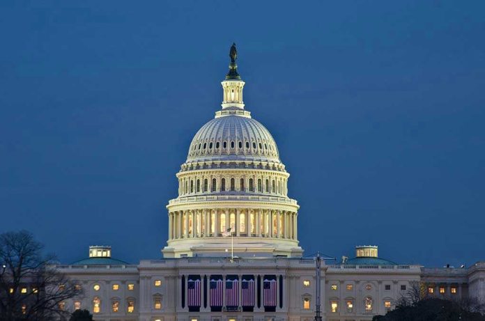 U.S. Capitol building illuminated at dusk.