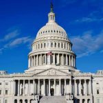 GOP Rep Pushes 10-Year Moratorium as Border Crisis Explodes US Capitol Building against blue sky.