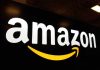 Amazon AXE 16,000 Jobs – Corporate Bloodbath! Amazon logo with a yellow smile arrow.