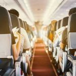 Airlines Introduce MAJOR NEW RULE – They’re Cracking Down! Passengers seated inside an airplane cabin.