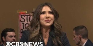 Activist STORMS Senate Hearing, Wearing HUGE Backpack