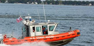 Coast Guard HAMMERS Cartel Smugglers With Giant Bust Coast Guard boat speeding on the water.