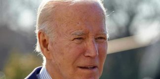 Biden’s Latest Racist Gaffe Goes Viral Elderly man in suit outside in daylight.