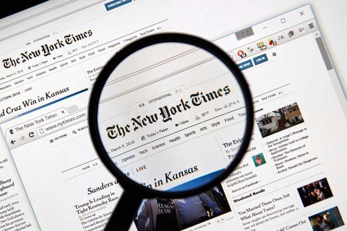 386787592 Magnifying glass over The New York Times website.