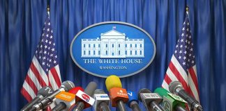 Pentagon’s UFO Secrets: Why So Much Secrecy? Multiple microphones at White House press briefing podium.