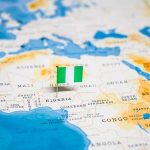 Shocking ‘Rape Festival’ Footage Sparks Global Outrage Flag pin marking Nigeria on Africa map.