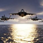 China-Pakistan’s Shocking Military Pact Unveiled Five jets flying low over the ocean at sunset.