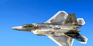 SHOCKING Stealth Drone Claim: Truth or Hoax? Fighter jet in flight against a clear blue sky.