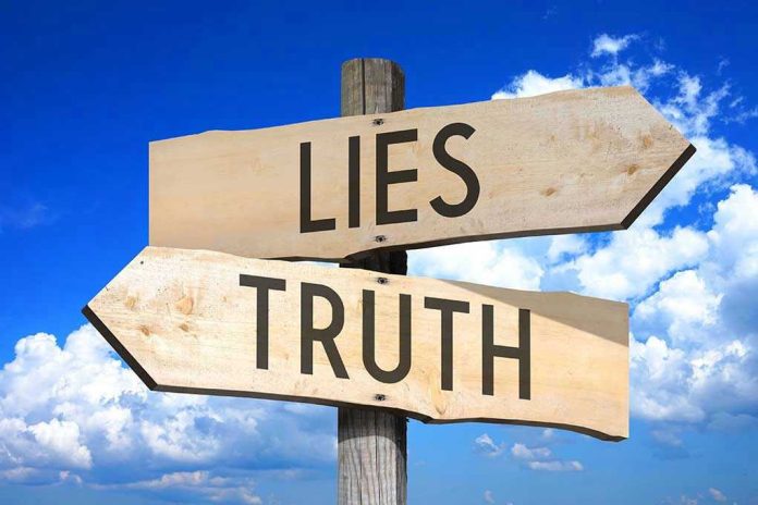 532218352 Signs pointing to Lies and Truth against sky.