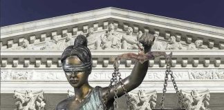 Federal Judge Had Sex in Chambers — Got a Private Slap on the Wrist Lady Justice statue in front of courthouse.