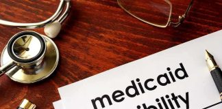 Medicaid SHOCK: The Truth Behind Ohio’s “Off Switch” Stethoscope pen document about Medicaid eligibility on table