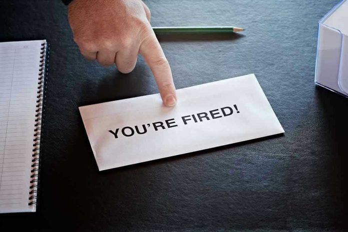 70617409 Envelope with YOURE FIRED and pointing finger.