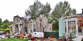 Palisades Fire Victims Being Robbed — While Waiting to Rebuild Houses with significant storm damage and debris scattered around the yard