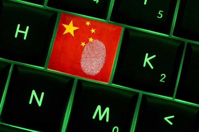 shutterstock_240941041.jpg Close-up of a keyboard key featuring the Chinese flag and a fingerprint
