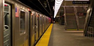 Soft-On-Crime Backlash Erupts Underground Subway station platform with train and exit stairs.