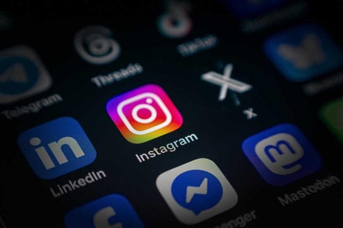 shutterstock_2637412547 Close-up of a smartphone screen displaying various social media app icons, including Instagram