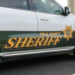 Sanctuary Showdown After Florida Dad Slain Polk County Sheriff vehicle parked outside building.
