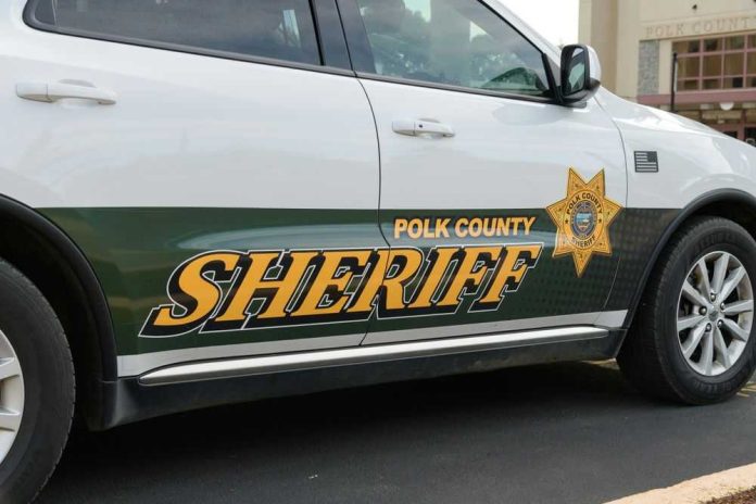 Polk County Sheriff vehicle parked outside building.