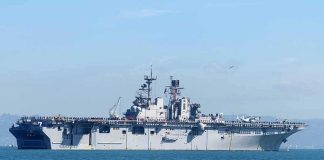 Long War Vibes — CENTCOM Widens The Map Aircraft carrier sailing on calm blue water