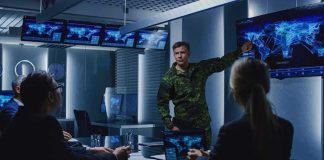 Victory Fantasy Meets Brutal Numbers military officer briefing team in command center