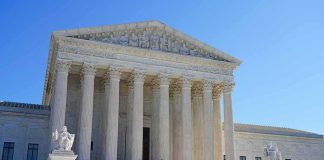Extradition Brawl: Tates vs. Britain Supreme Court building with grand columns and steps