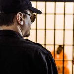 Manslaughter Twist Triggers Outrage Security guard watching inmates behind jail bars