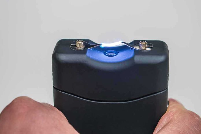 shutterstock_1587093958 stun gun emitting electric arc