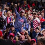 Forged Media Blitz Hits Top Contender Crowd of supporters cheering at an indoor political rally